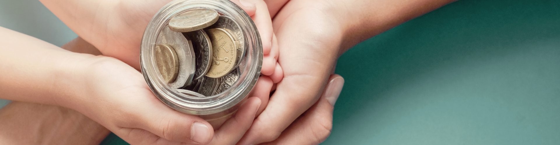 child and parent hands holding money jar, donation, saving, charity, family finance plan concept, Coronavirus economic stimulus rescue package, superannuation concept